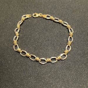 7” 14k gold (white and yellow) bracelet from Turkey.